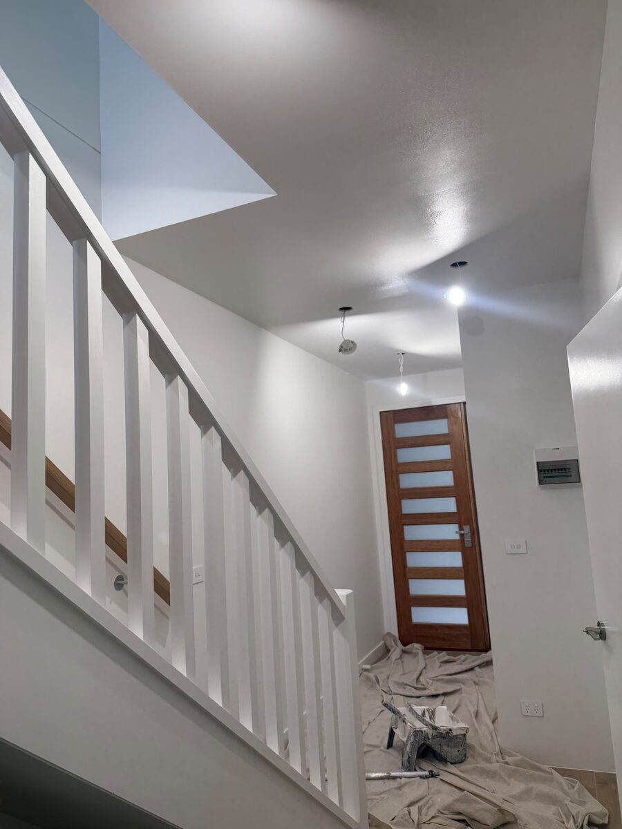 Hallway with freshly stained front door