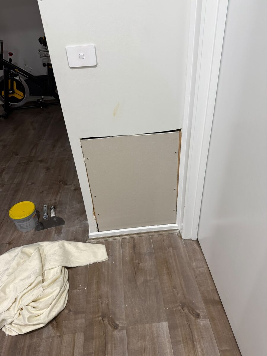 Plaster patch applied to an interior wall ready for sanding